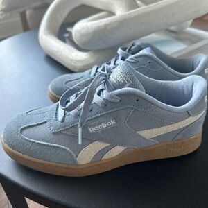 Blue suede Reebok sneakers